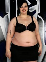 fattie milla monroe playing near the wall