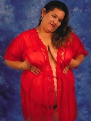 Mature Dark Haired BBW Posing with Her Huge Belly